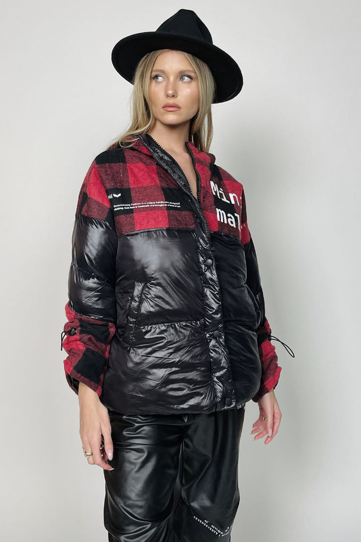 Black and red tartan puffer jacket at Runway Secrets