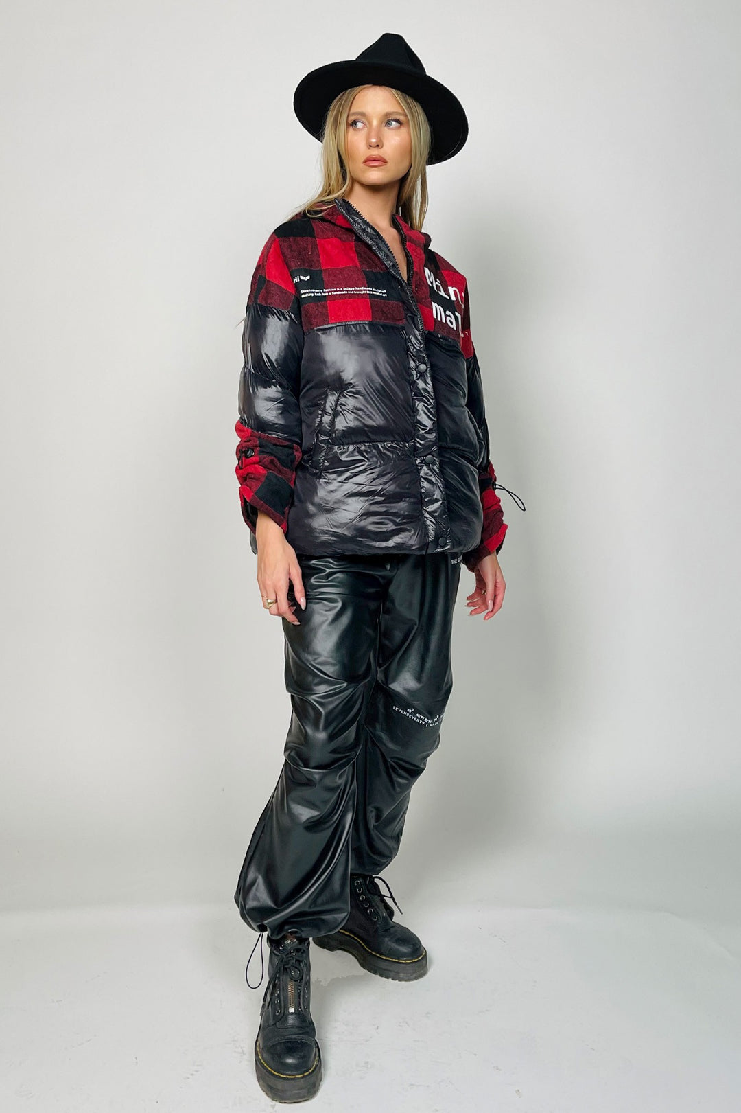 Black and red tartan puffer jacket at Runway Secrets