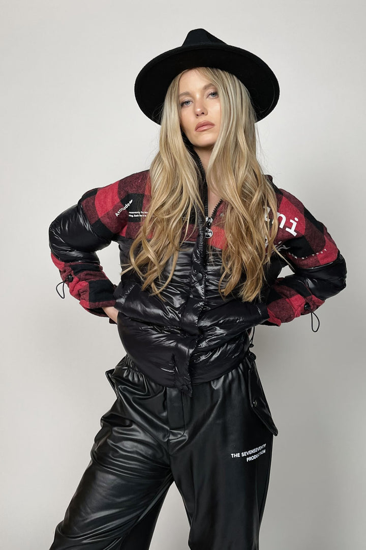 Black and red tartan puffer jacket at Runway Secrets