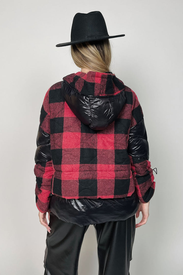 Black and red tartan puffer jacket at Runway Secrets