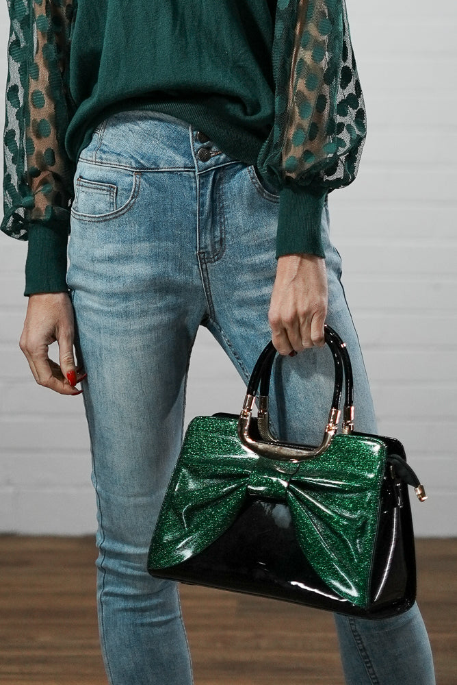 Faux leather shimmer bow handbag | Runway Secrets