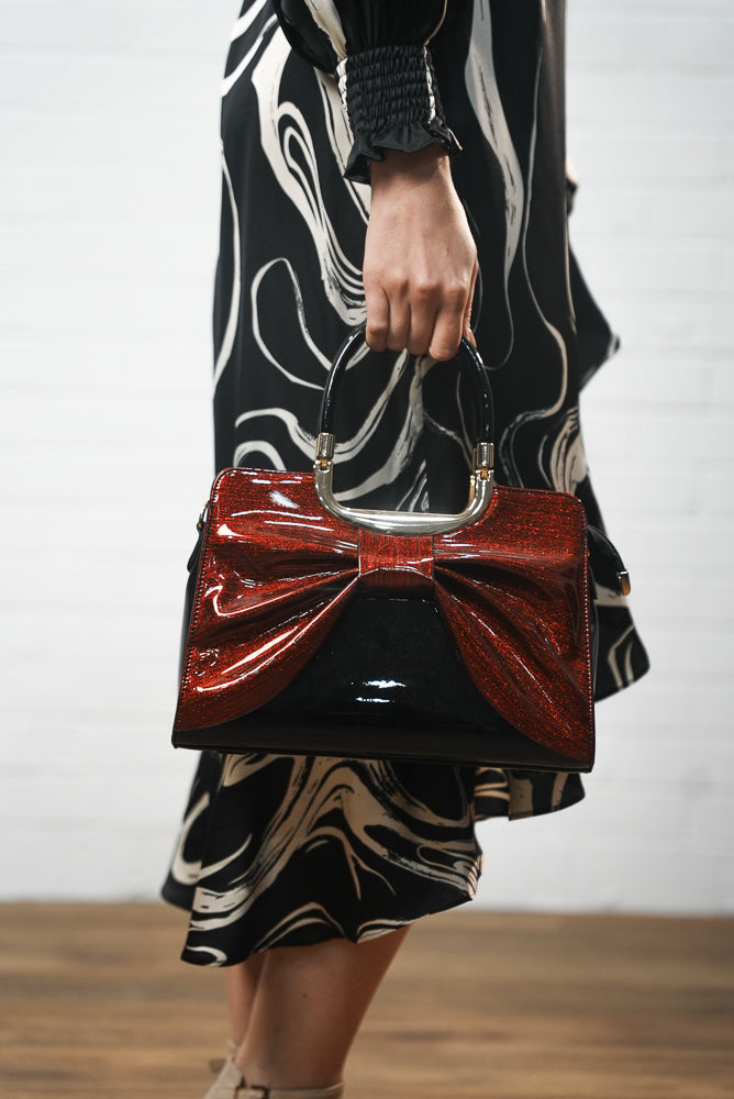 red Faux leather shimmer bow handbag | Runway Secrets