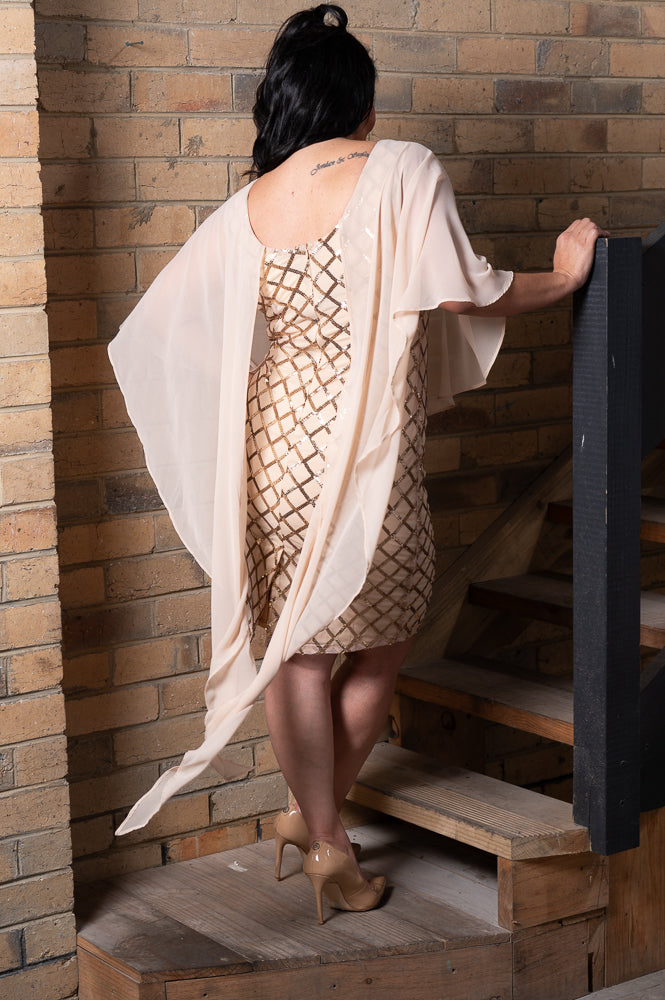 Layered short dress with argyle metallic print and mesh cape | Runway Secrets