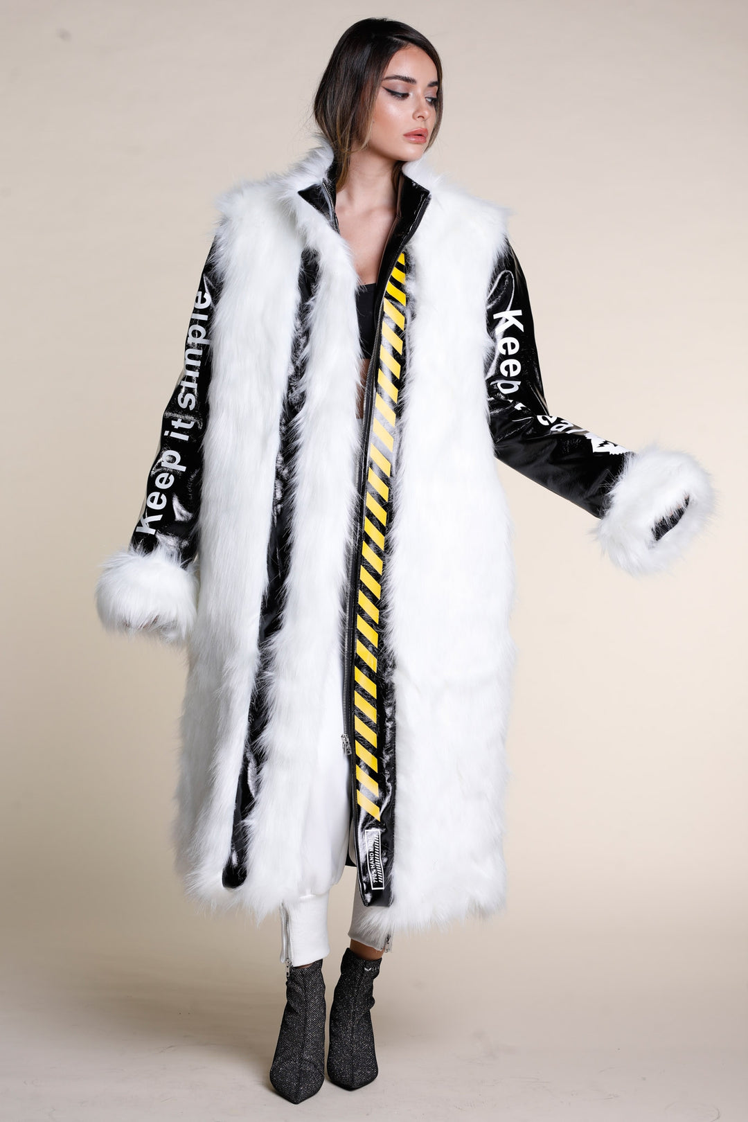 Black vinyl and white faux fur coat | Runway Secrets