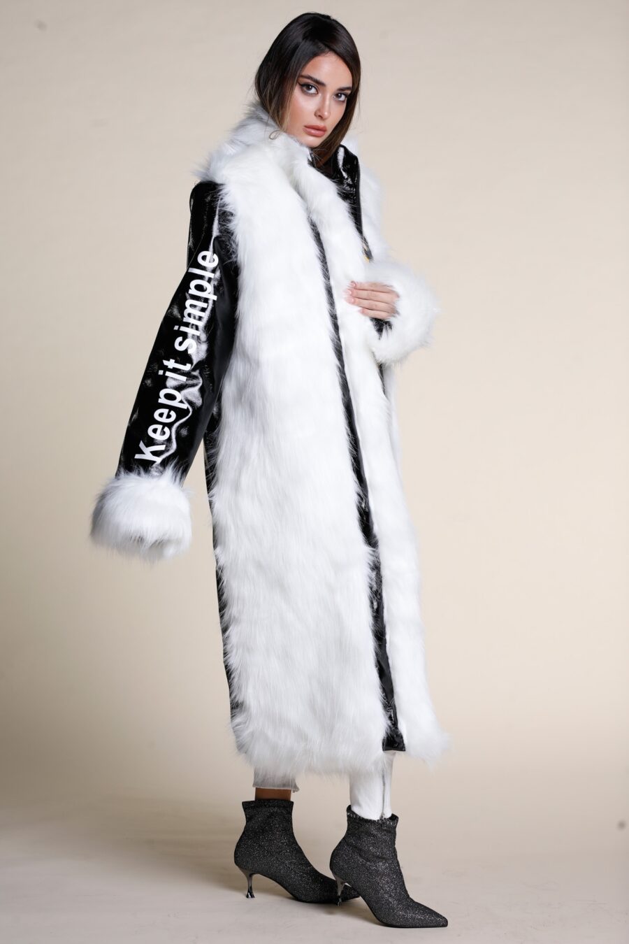 Black vinyl and white faux fur coat | Runway Secrets